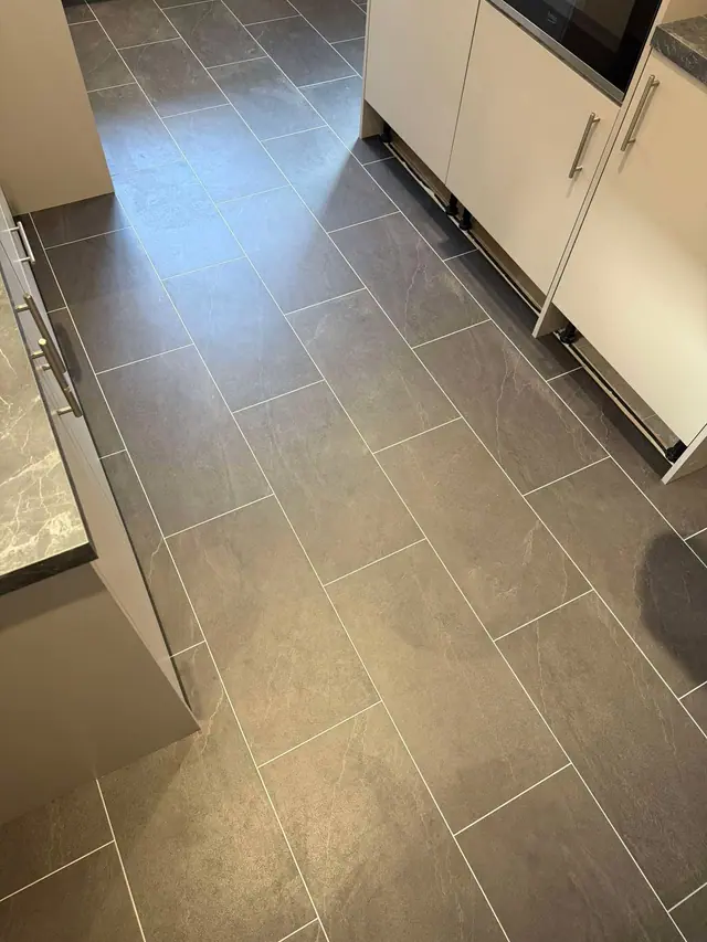 Dark stone-effect LVT with light joint lines
