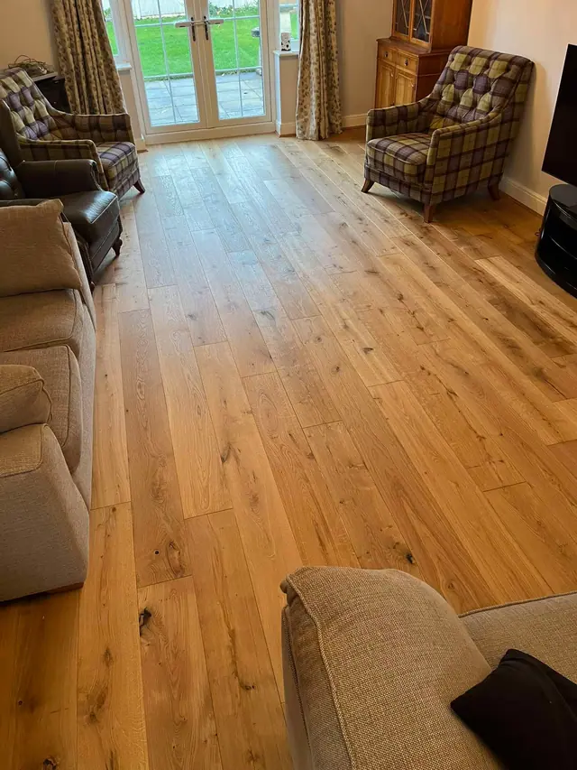 Real wood flooring in a furnished living room
