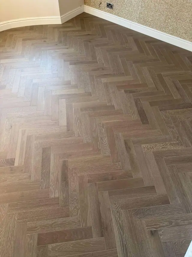 Real wood herringbone with a subtle grain