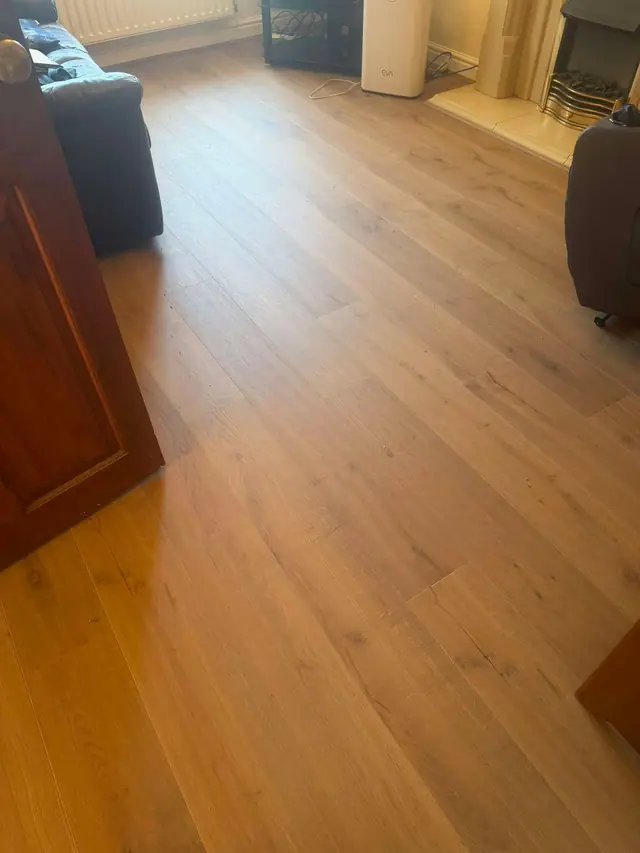 Warm oak-effect laminate in a living room