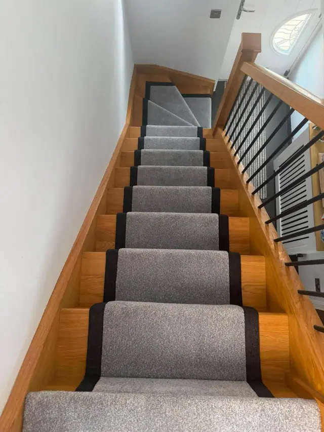 Grey runner with dark binding